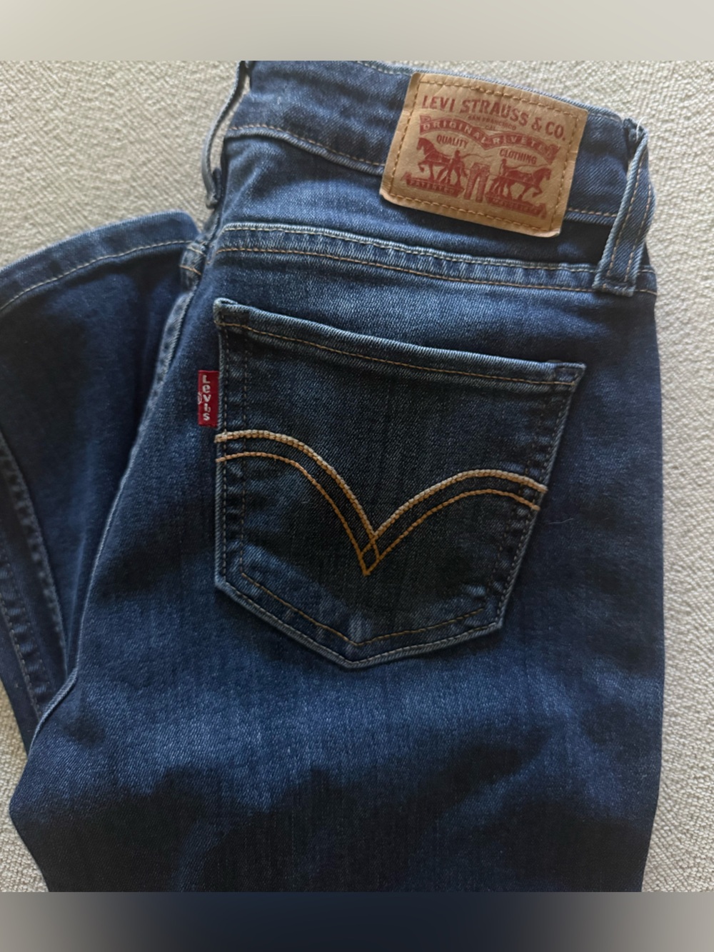 Levi's Blue Denim Jeans with Tan Stitching and Red Tab